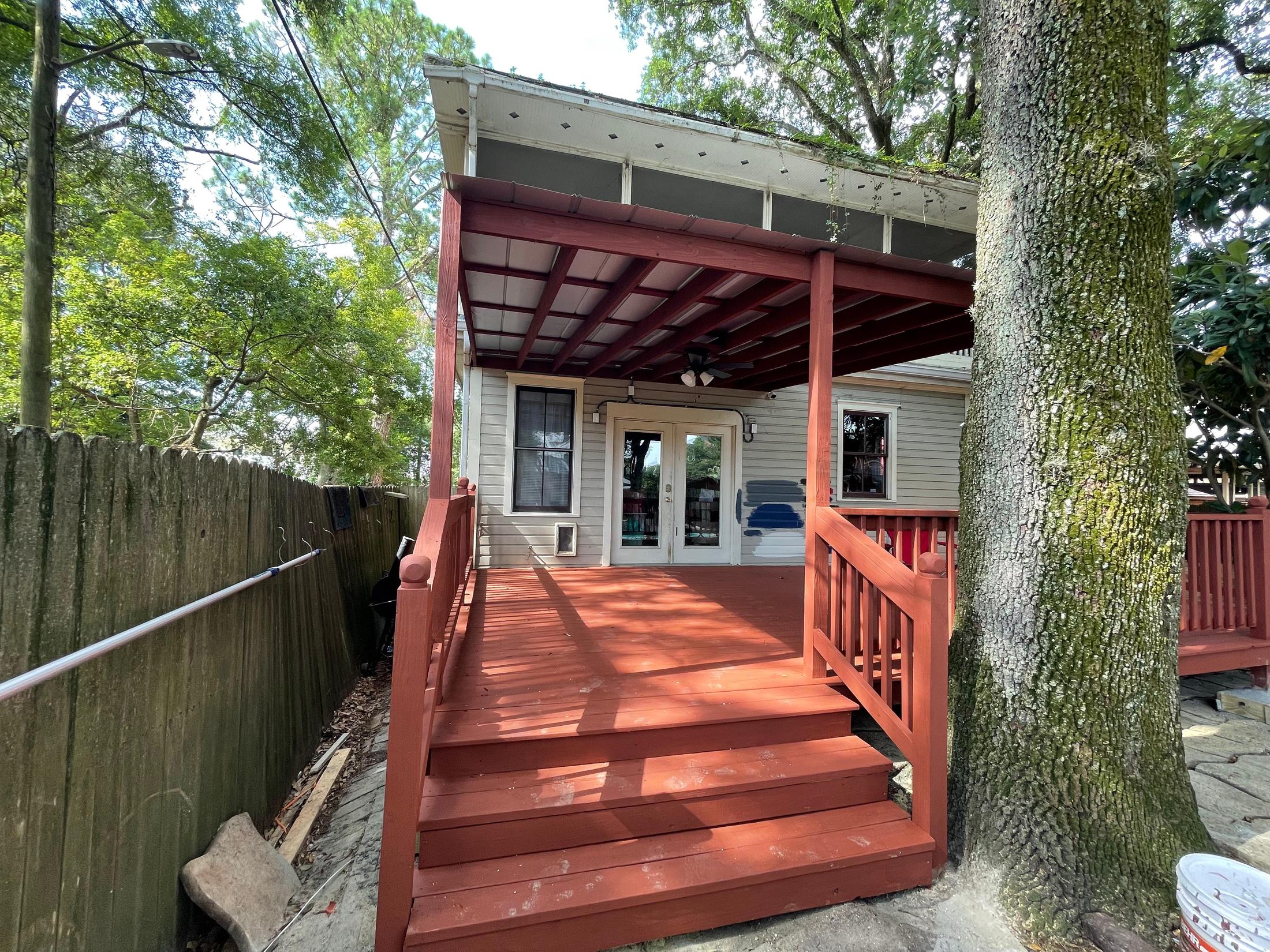 New painted deck and stairs in a backyard